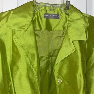 Kate Hill Peridot Green side tie blouse with cuff sleeves.